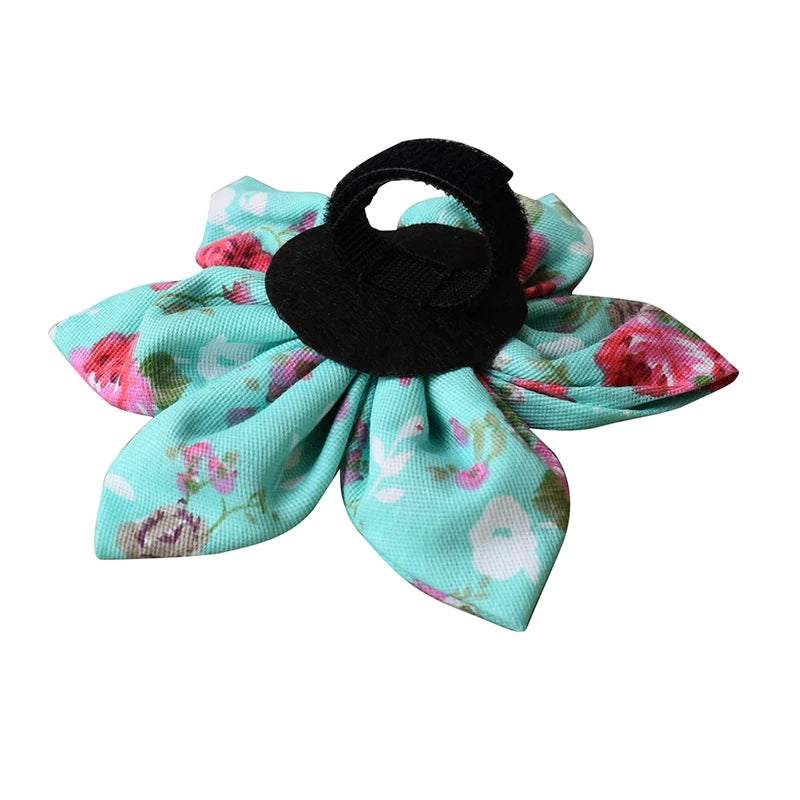 Floral fabric dog collar addon with a black center on a white background