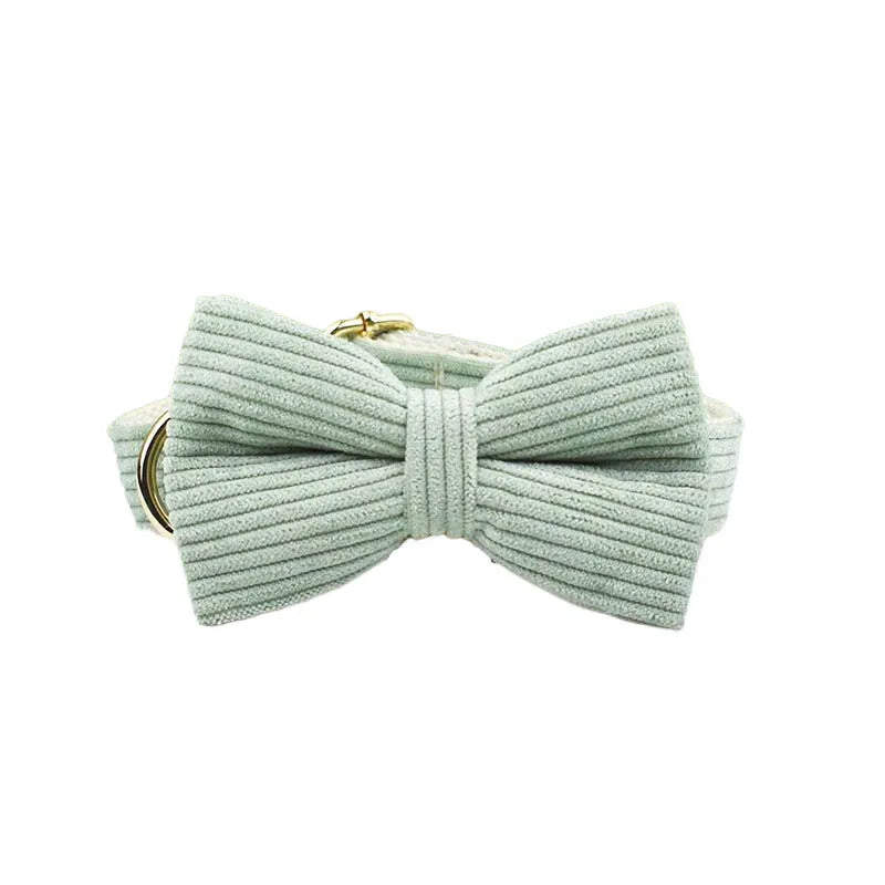 Light green ribbed bow tie on a white background