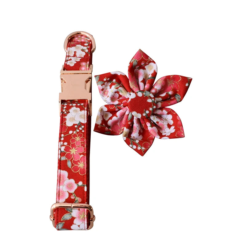 Red floral dog collar and bow tie set on a white background