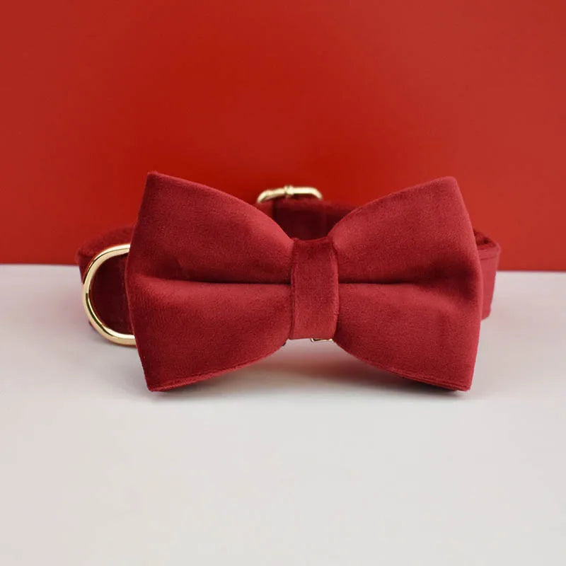 Red bow tie on a white surface with a red background