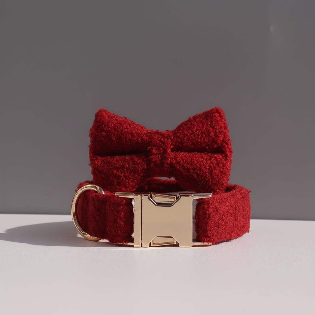Red textured bow tie and collar set on a neutral background