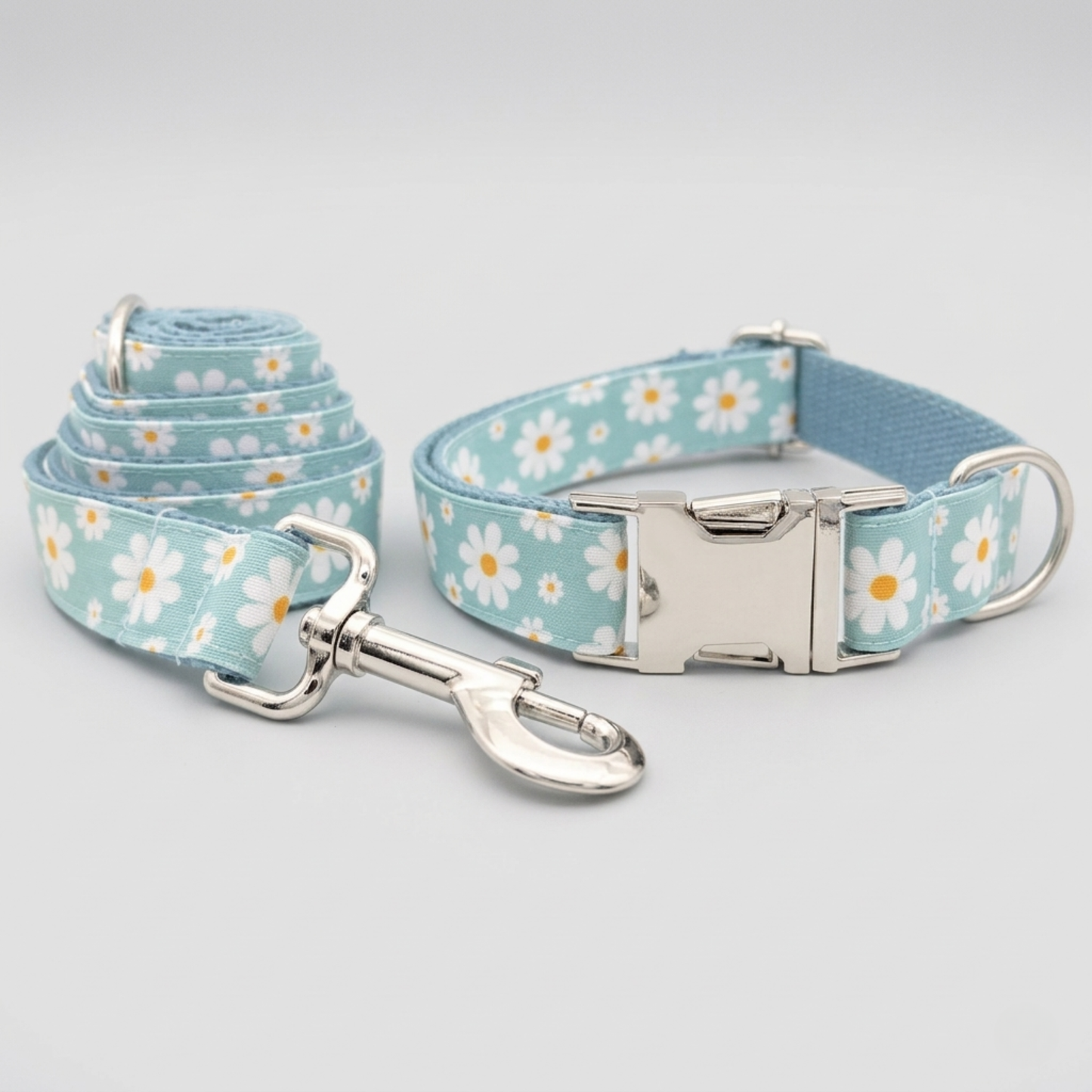 Dog collar and leash set with floral pattern on a light gray background