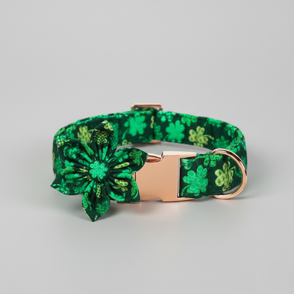 Green floral patterned dog collar with rose gold buckle on a light gray background