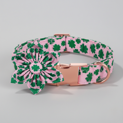 Dog collar with pink and green floral pattern on a gray background