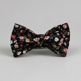 Floral patterned bow tie on a gray background