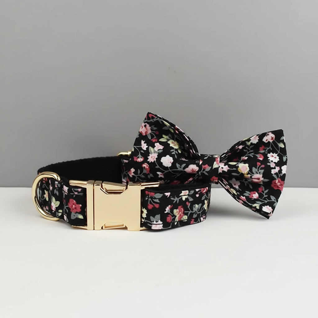 Floral-patterned dog collar and bow tie on a gray background