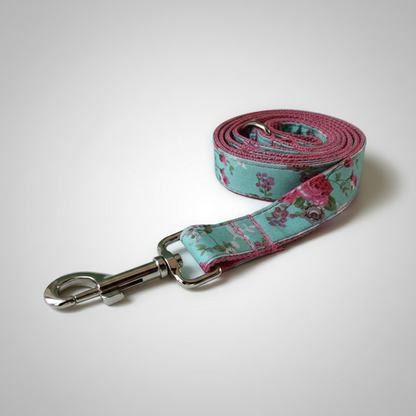 Floral patterned dog leash on a white background